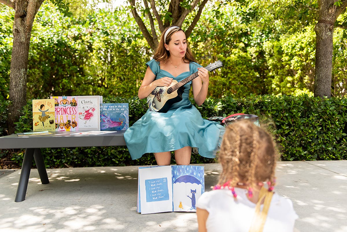 krystal playing music for a kid