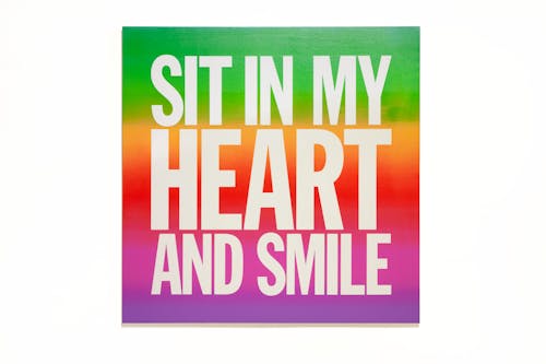 SIT IN MY HEART AND SMILE